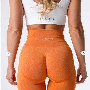 NVGTN curve seamless leggings in burnt orange. Size XL.